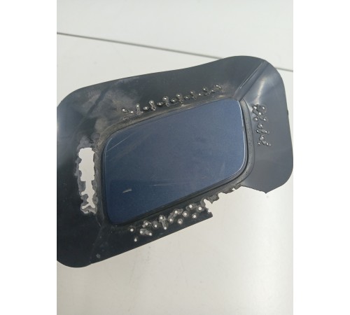 Форсунка омывателя фар левая