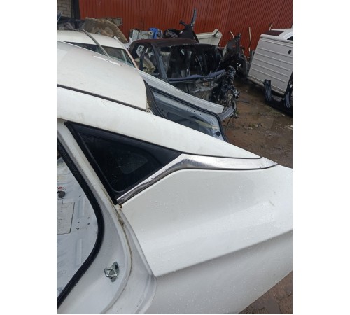 Стекло заднее глухое левое