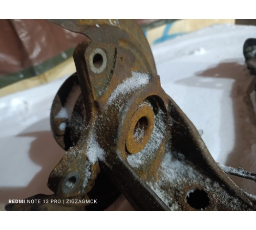 Рычаг задний левый