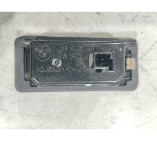 Плафон подсветки номера левый