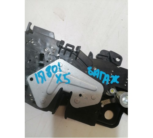 Замок крышки багажника