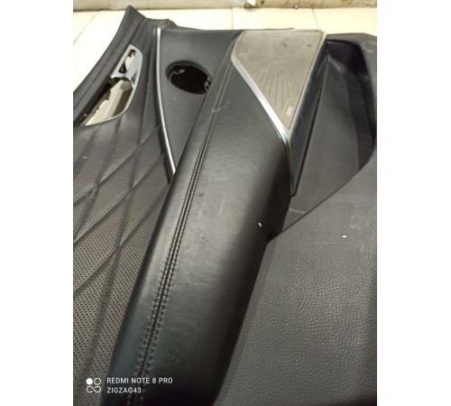 Обшивка двери(передняя левая)