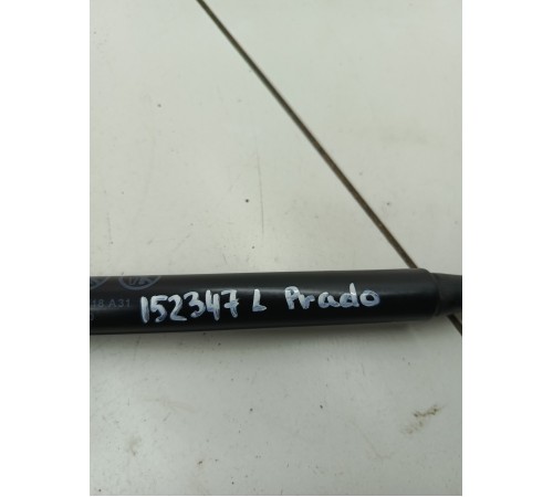 Амортизатор капота левый