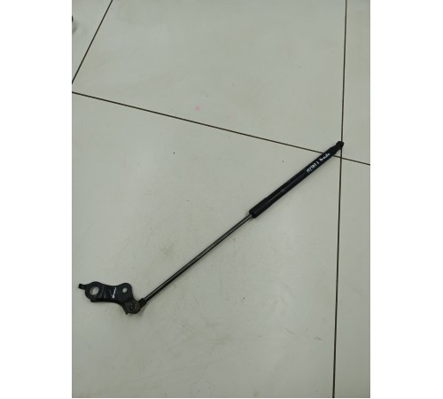 Амортизатор капота левый