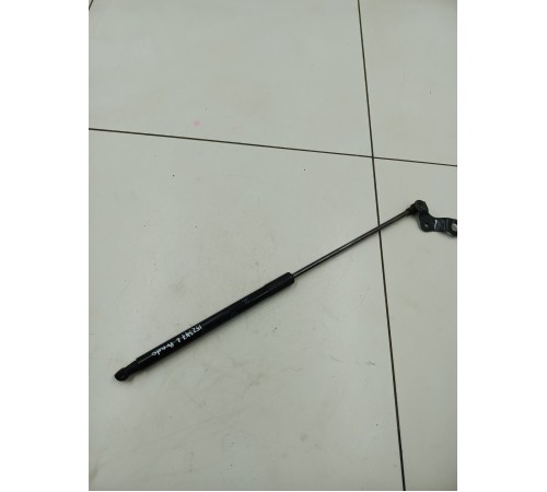 Амортизатор капота левый