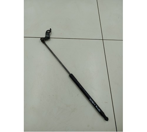 Амортизатор капота левый