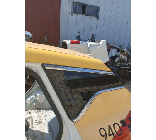 Глухое стекло заднее левое