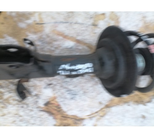 Амортизатор передний левый