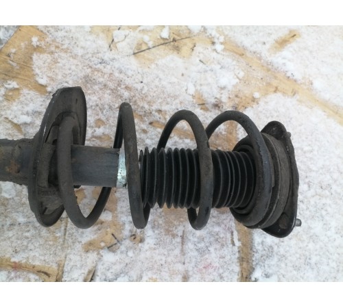 Амортизатор передний левый