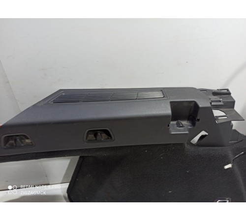 Обшивка багажника (левая)