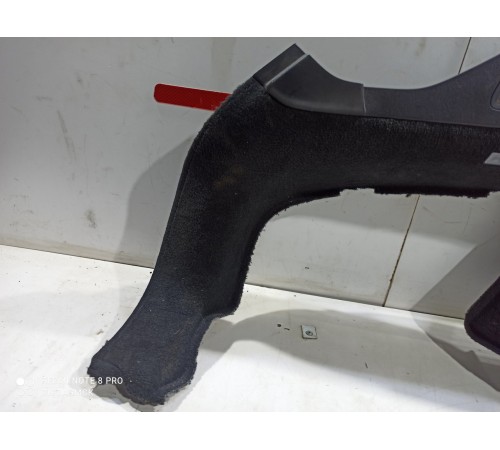 Обшивка багажника (левая)