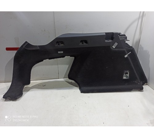 Обшивка багажника (левая)