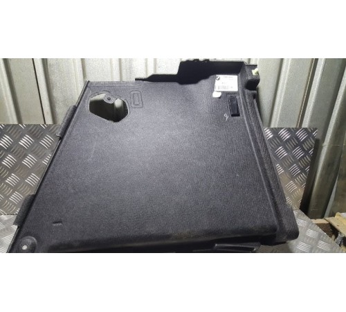 Обшивка багажника задн.