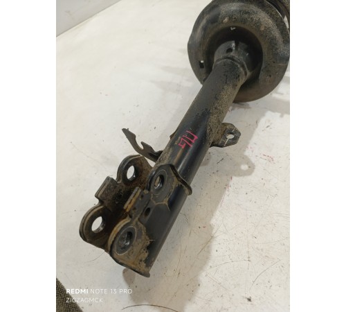 Амортизатор передний левый