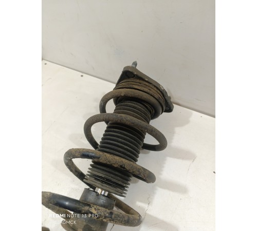 Амортизатор передний левый