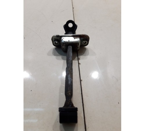 Ограничитель двери (передний, левый)