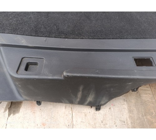 Обшивка багажника левая