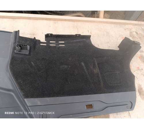 Обшивка багажника левая