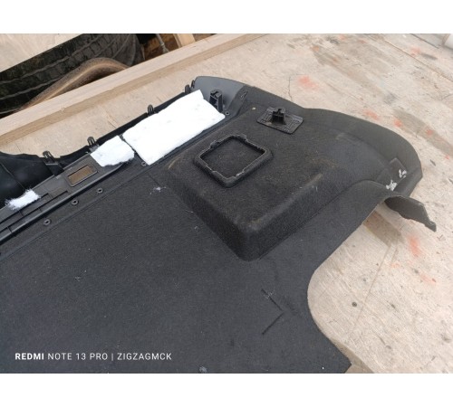 Обшивка багажника левая