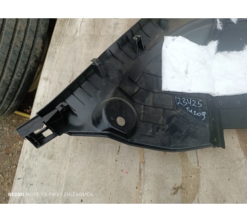 Обшивка багажника левая