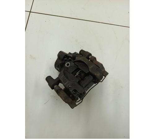 Суппорт задний левый