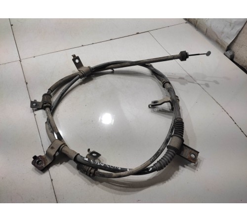 Трос стояночного тормоза (задний, левый)