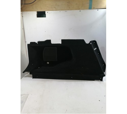 Обшивка багажника левая