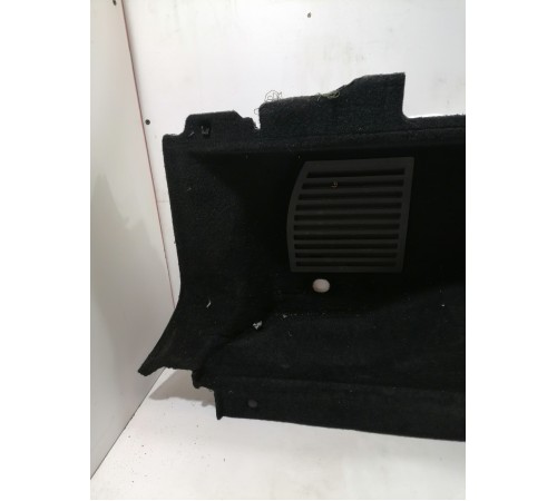 Обшивка багажника левая