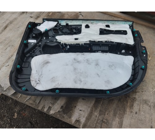 Обшивка двери передняя левая