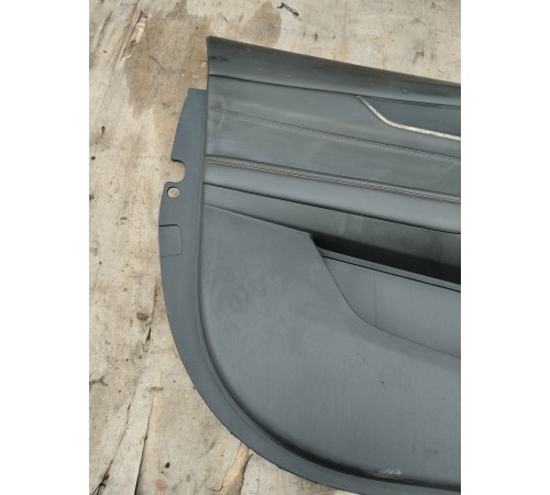 Обшивка двери передняя левая