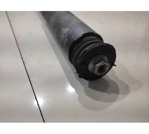 Амортизатор (задний, левый)