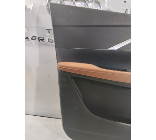 Обшивка двери передняя левая