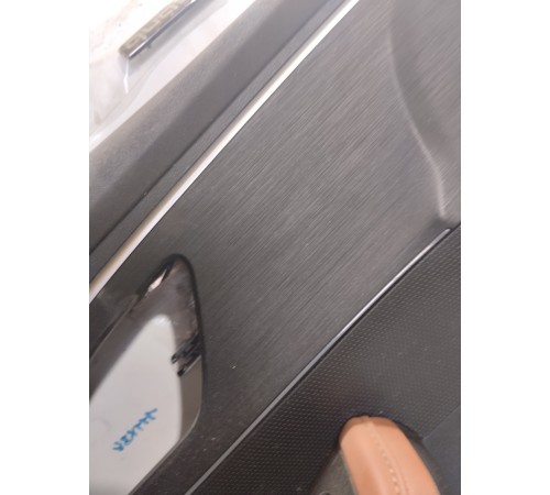 Обшивка двери передняя левая