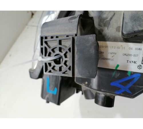 Фара головного света левая