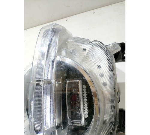 Фара головного света левая