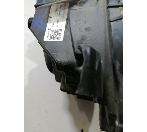 Фара головного света левая