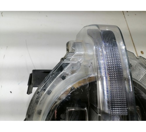 Фара головного света левая