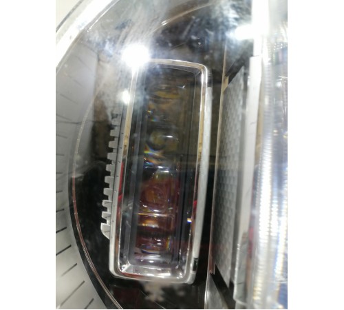 Фара головного света левая