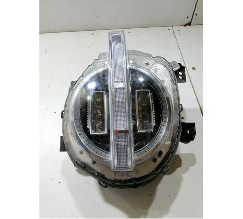 Фара головного света левая