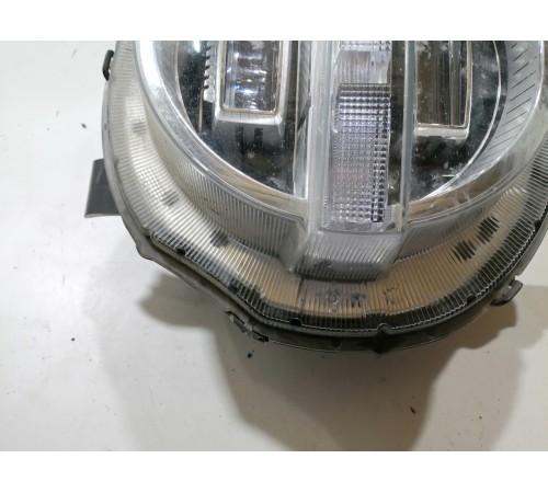 Фара головного света левая