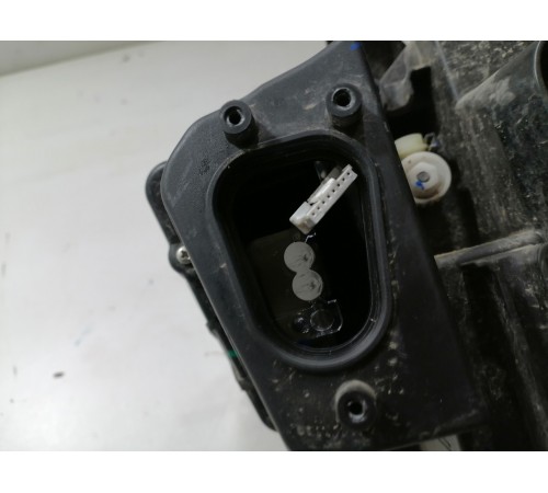 Фара головного света левая