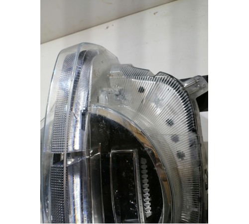 Фара головного света левая