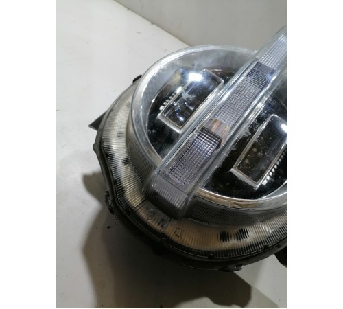 Фара головного света левая