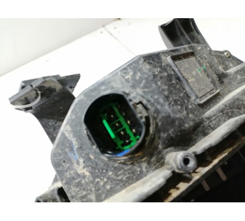 Фара головного света левая