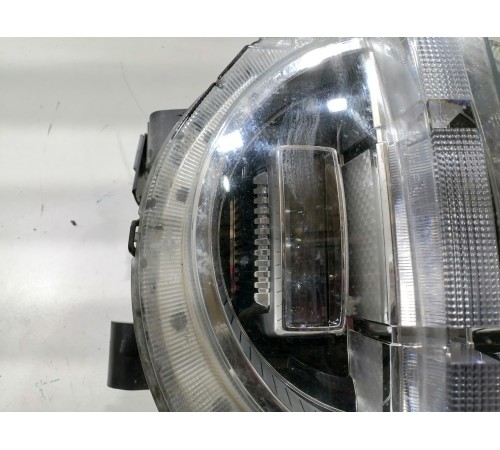 Фара головного света левая