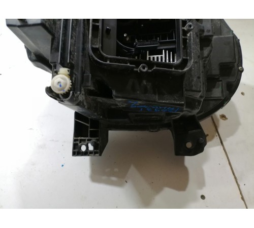 Фара головного света левая