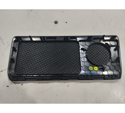 Накладка (сетка) динамика задняя левая