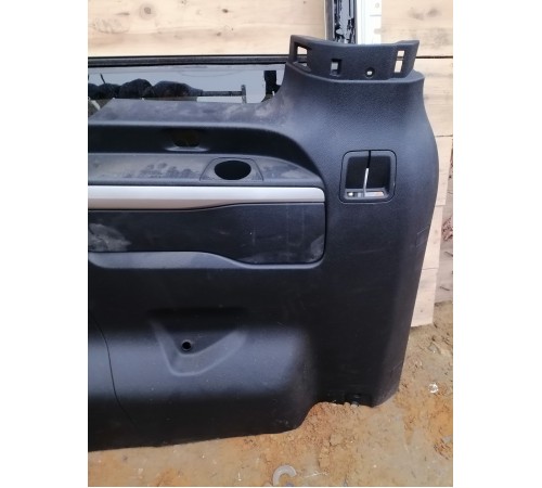 Обшивка багажника левая