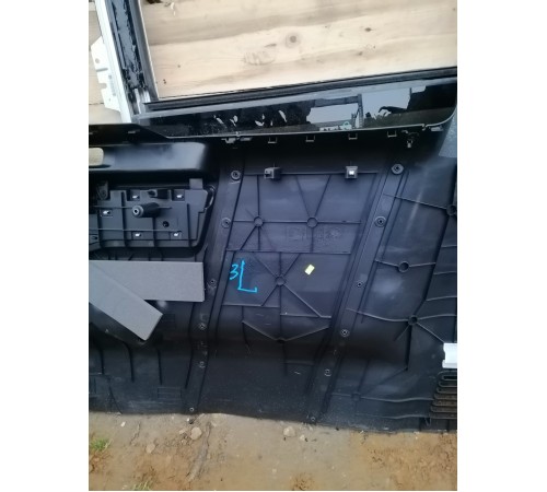 Обшивка багажника левая
