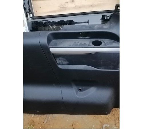 Обшивка багажника левая